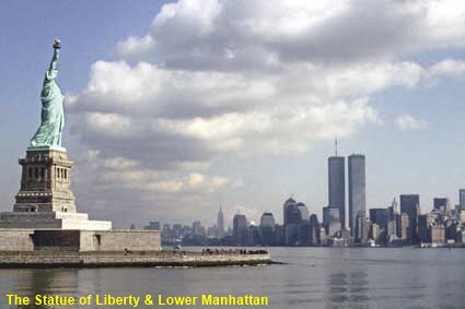 The Statue of Liberty & Lower Manhattan from ferry, New York, NY, USA