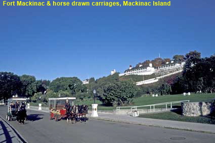 Fort Mackinac & horse drawn carriages, Mackinac Island, MI, USA Fort Mackinac & horse drawn carriages, Mackinac Island, MI, USA