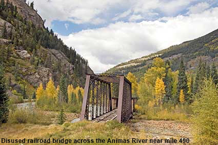 Disused railroad bridge across the Animas River near mile 490, Durango & Silverton Railroad, CO, USA