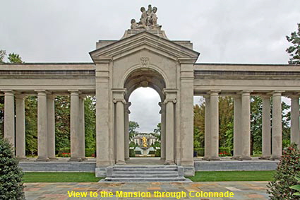 View to Mansion through Colonnade, Nemours Mansion, Wilmington, DE, USA View to Mansion through Colonnade, Nemours Mansion, Wilmington, DE, USA