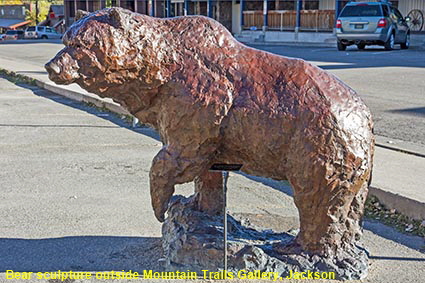 Bear sculpture outside Mountain Trails Gallery, Center Street, Jackson, WY, USA
